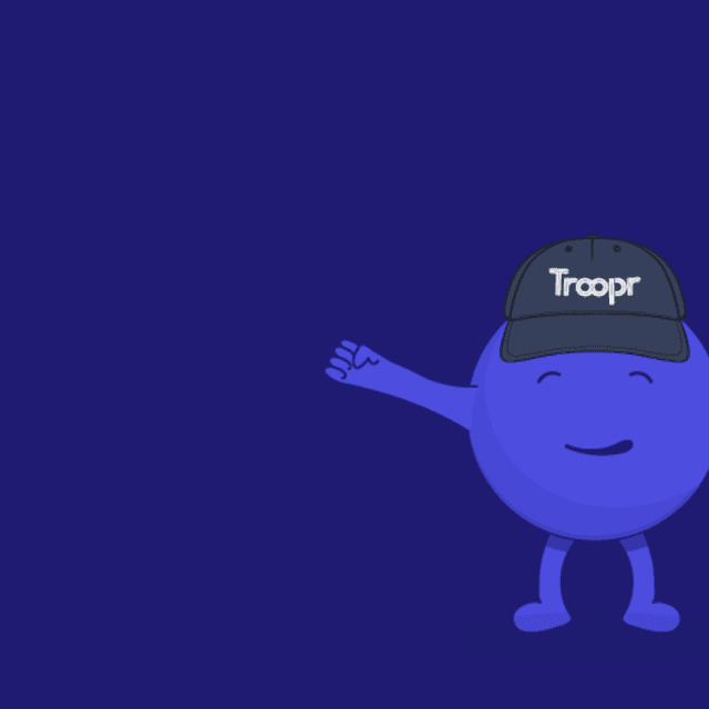 Troopr mascot wearing troopr hat cheering